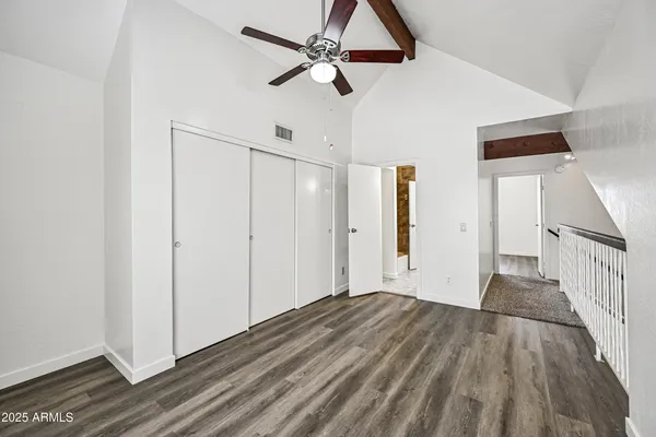 a view of a livingroom with wooden floor