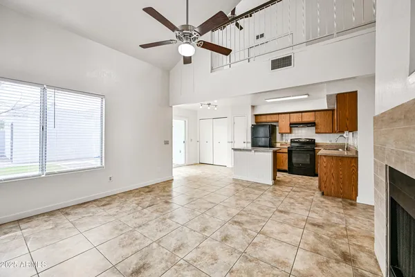 a view of kitchen with stainless steel appliances cabinets and a kitchen counter top space