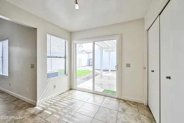 a view of an empty room and window