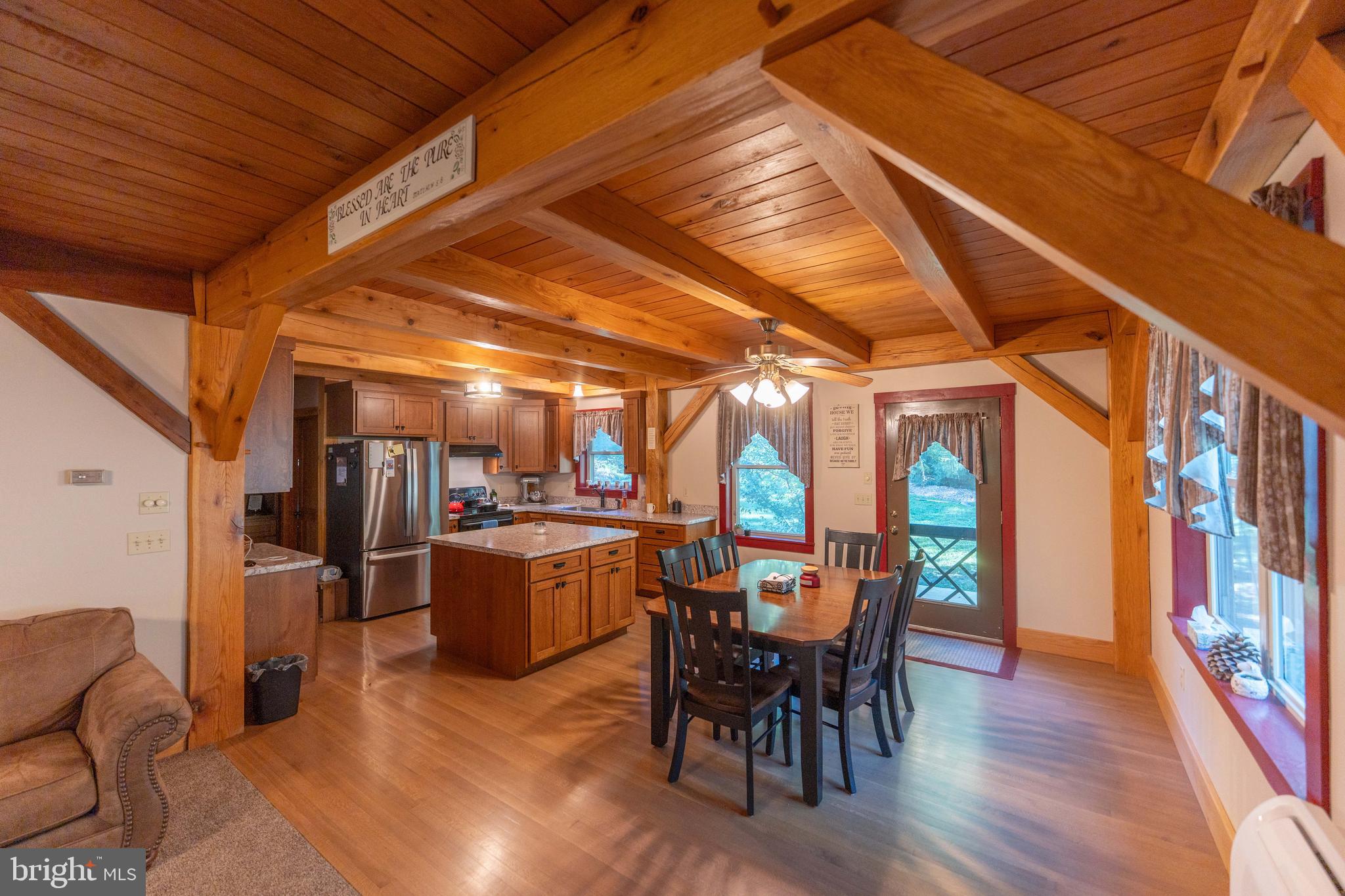3171 Ritner Highway Newville, PA 17241 - Photo 12 of 63 a view of a dining room with furniture window and wooden floor