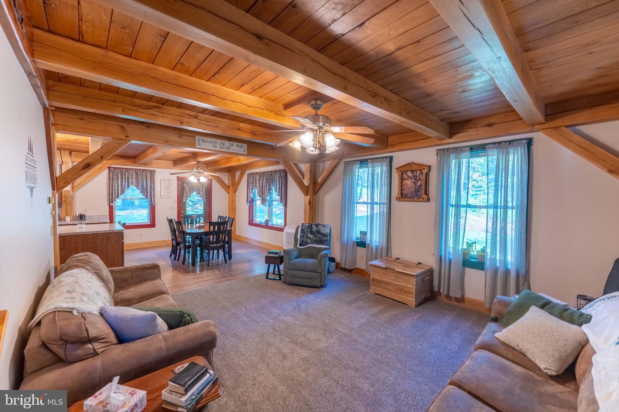 3171 Ritner Highway Newville, PA 17241 - Photo 13 of 63 a living room with furniture and a large window