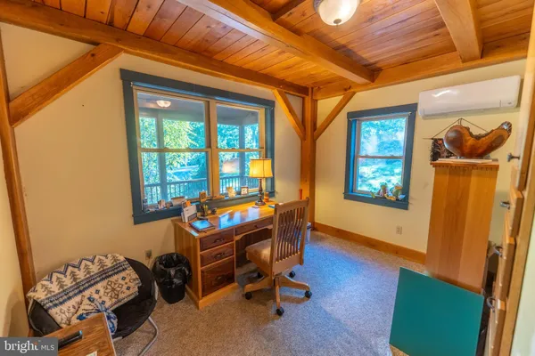 a view of living room with granite countertop furniture and washer dryer
