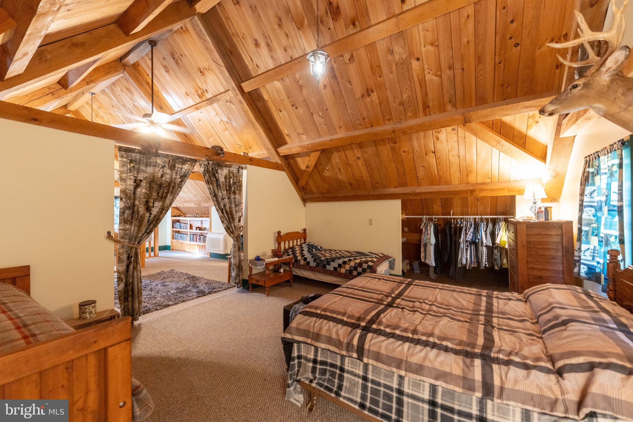 3171 Ritner Highway Newville, PA 17241 - Photo 22 of 63 a bed room with a bed and a balcony