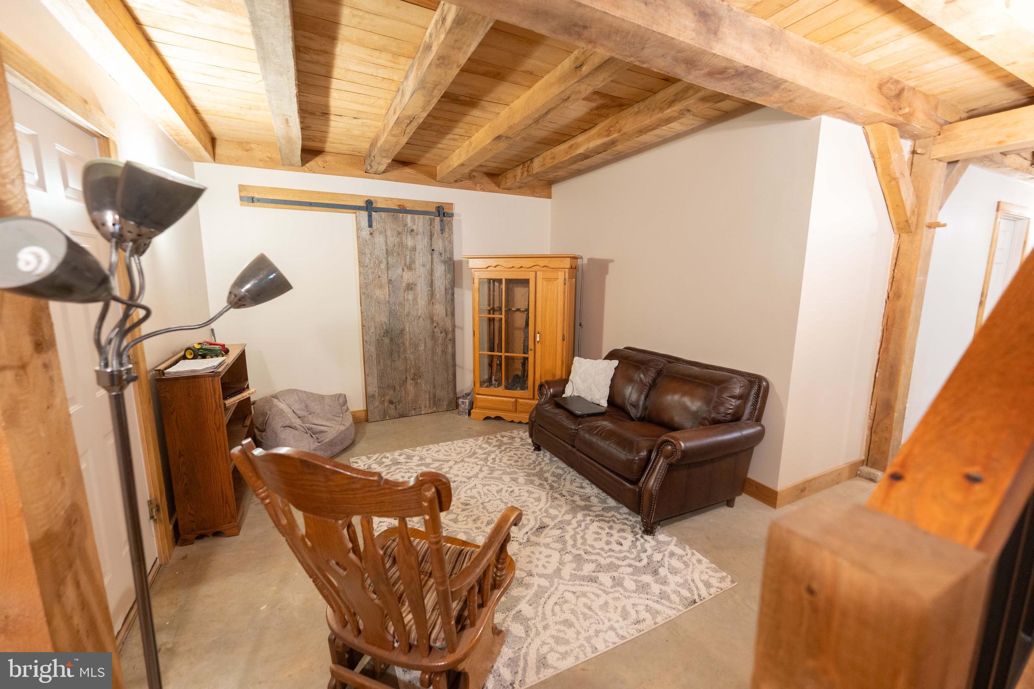 3171 Ritner Highway Newville, PA 17241 - Photo 25 of 63 a living room with furniture and a couch