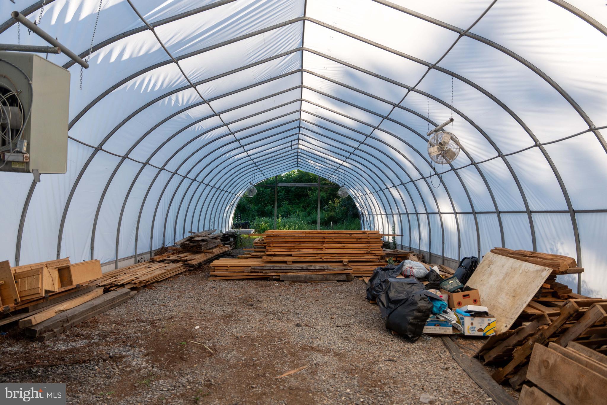 3171 Ritner Highway Newville, PA 17241 - Photo 46 of 63 a view of a backyard with chairs and a potted plant