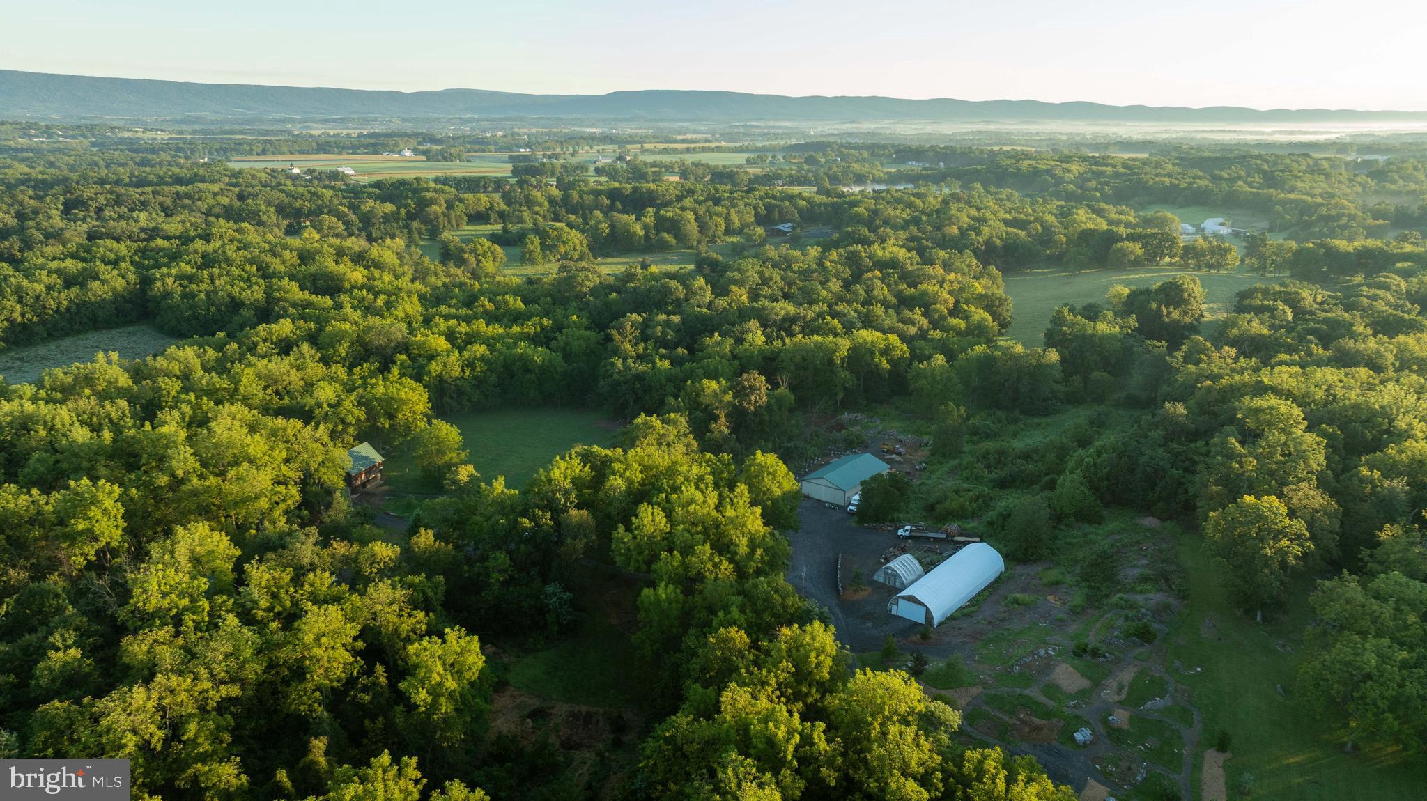 3171 Ritner Highway Newville, PA 17241 - Photo 62 of 63 a view of a lake with a mountain in the background
