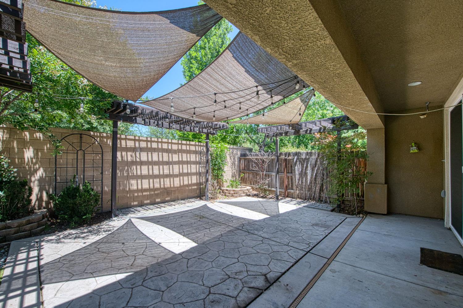 3521 Buckingham Avenue Clovis, CA 93619 - Photo 30 of 33 a backyard of a house with lots of green space