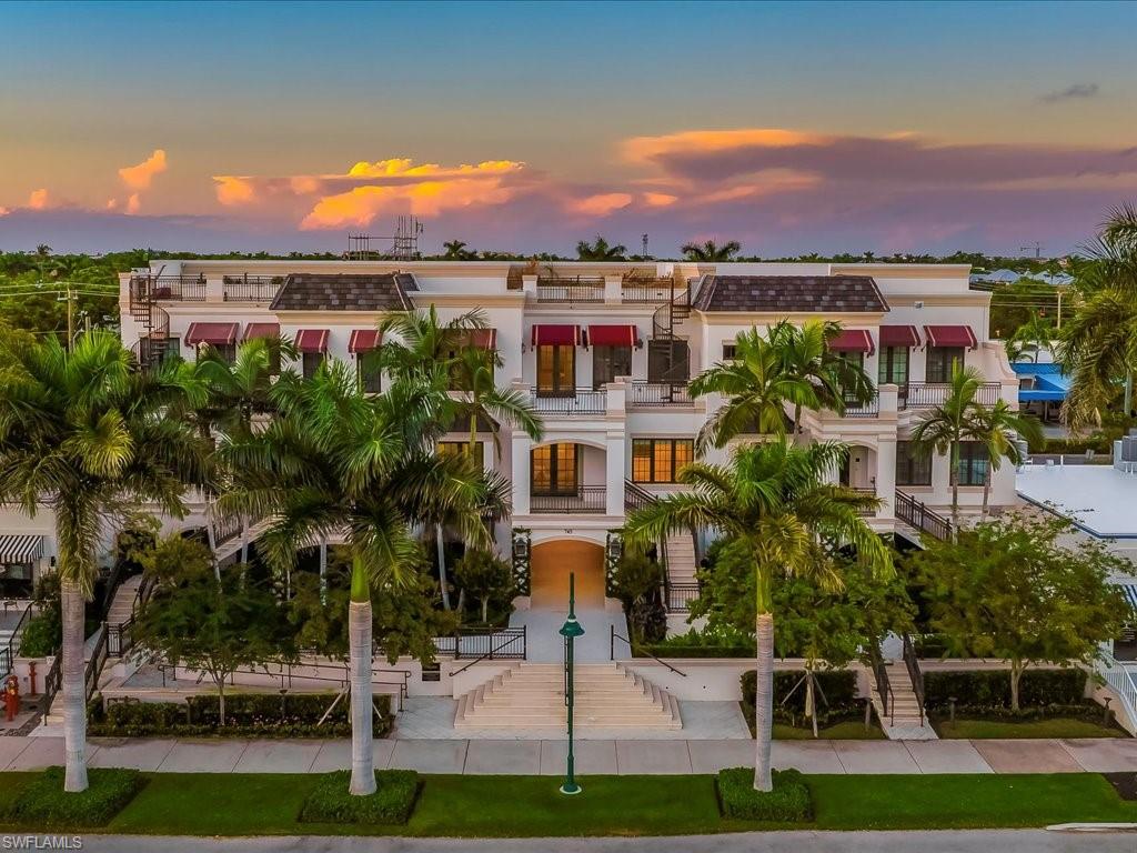 745 12th Avenue South, Unit 102 Naples, FL 34102 - Photo 1 of 50 a view of a patio with table and chairs and potted plants