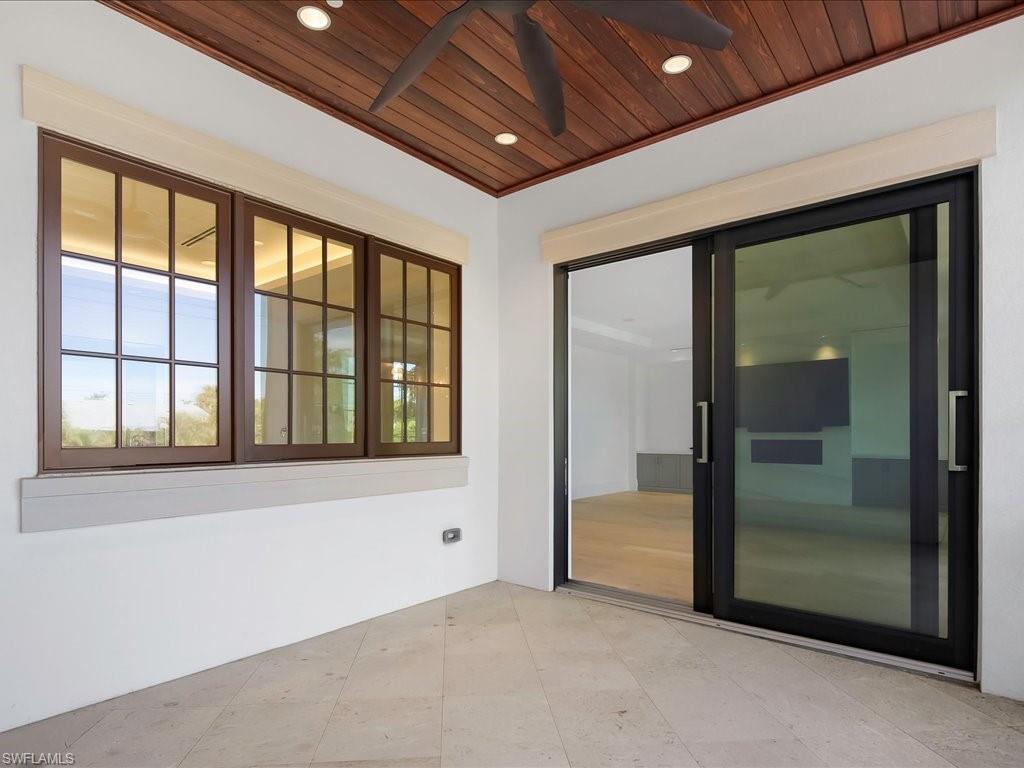 745 12th Avenue South, Unit 102 Naples, FL 34102 - Photo 23 of 50 a view of an empty room with a window