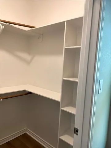 a view of walk in closet with window