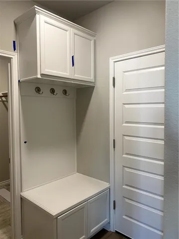 a view of walk in closet with window