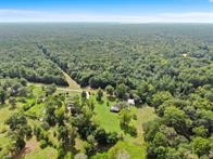 24831 River Terrace Road Huffman, TX 77336 - Photo 5 of 9 an aerial view of residential houses with green space