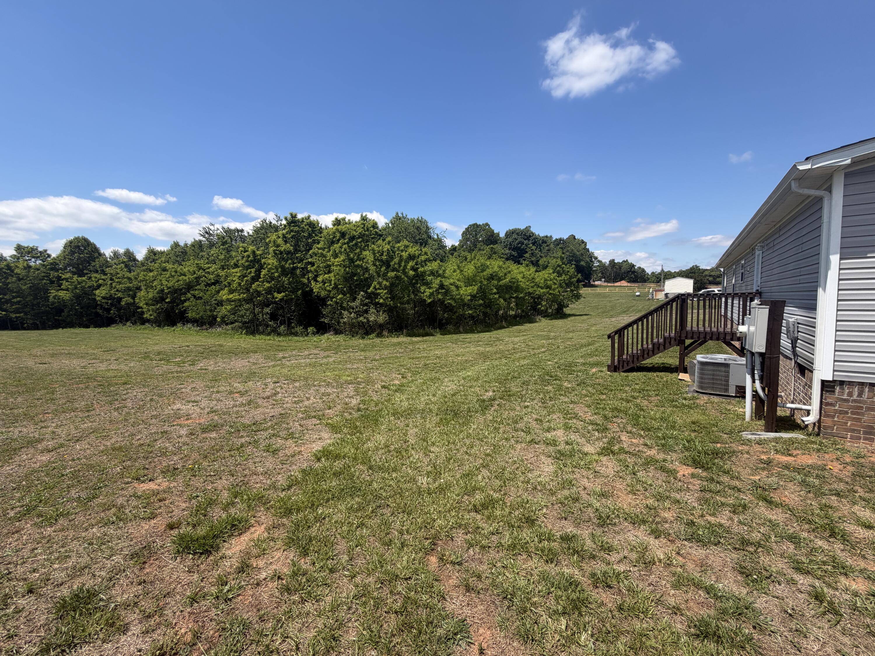 1644 Gap Road Chatham, VA 24531 - Photo 2 of 15 a backyard of a house with lots of green space