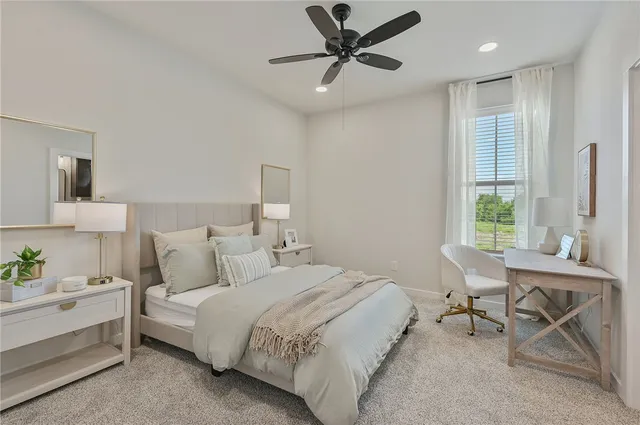 a view of a livingroom with wooden floor and stairs