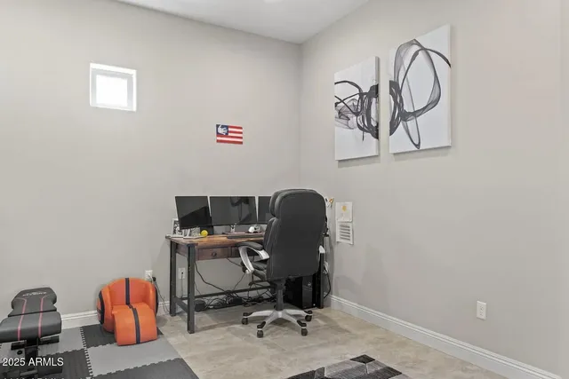 a kitchen with granite countertop a sink and cabinets