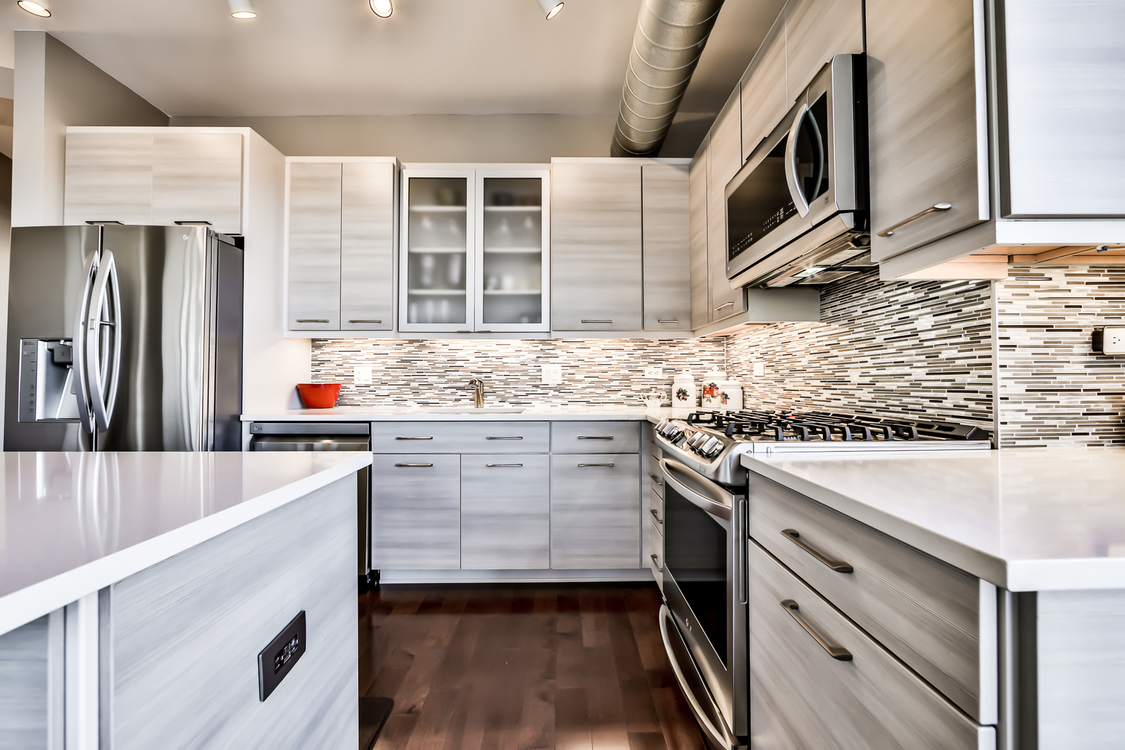 1200 West Monroe Street, Unit 801 Chicago, IL 60607 - Photo 11 of 26 a kitchen with a sink stove and refrigerator
