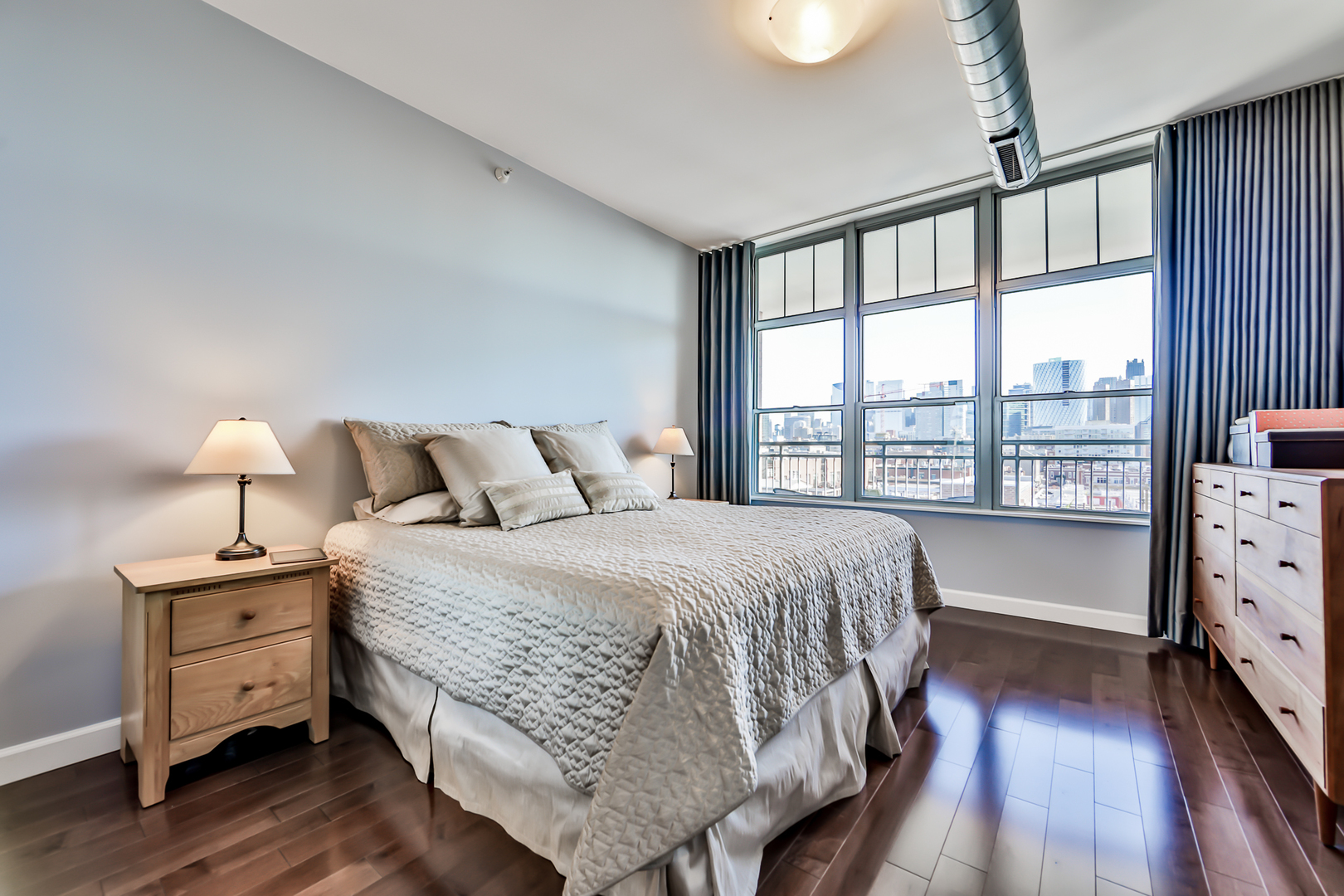 1200 West Monroe Street, Unit 801 Chicago, IL 60607 - Photo 14 of 26 a bedroom with a bed and a window