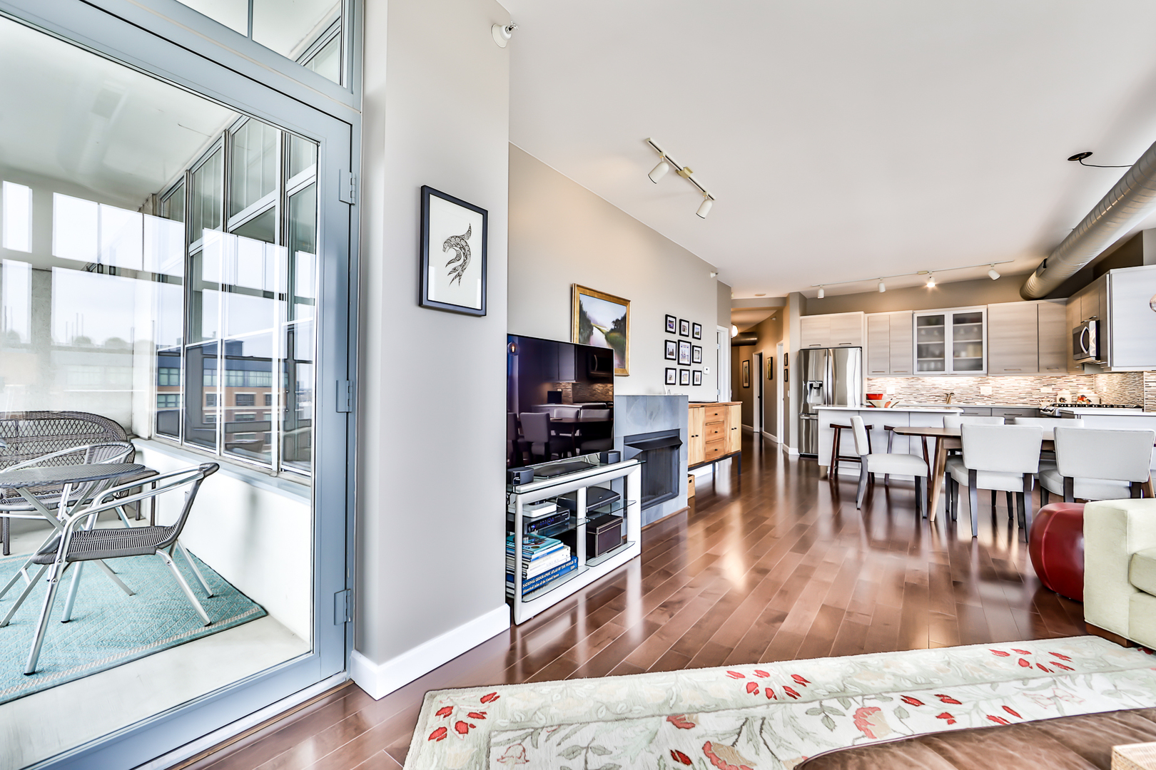 1200 West Monroe Street, Unit 801 Chicago, IL 60607 - Photo 3 of 26 a living room with furniture and a table