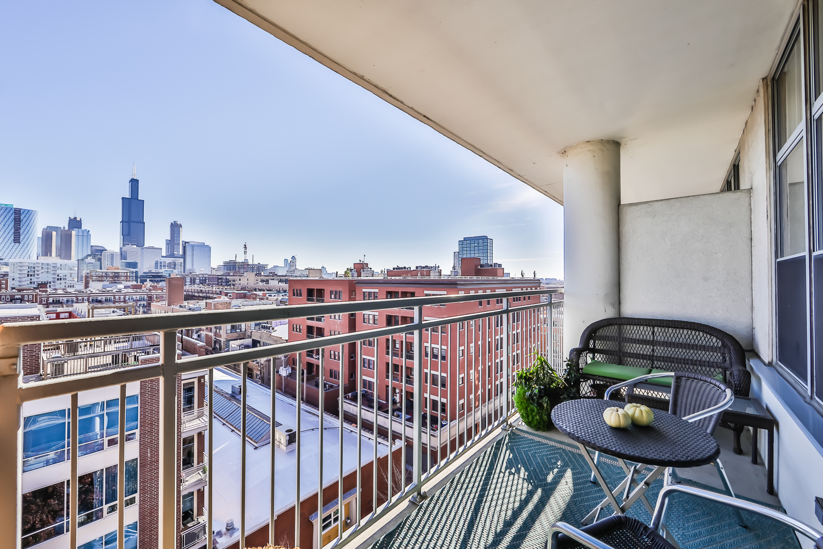 1200 West Monroe Street, Unit 801 Chicago, IL 60607 - Photo 4 of 26 a view of a balcony with furniture