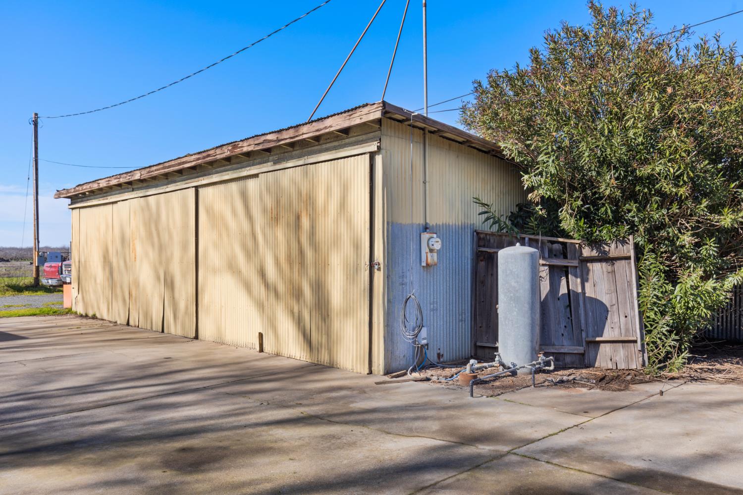 3781 Larkin Road Biggs, CA 95917 - Photo 24 of 34 a view of a house with a backyard
