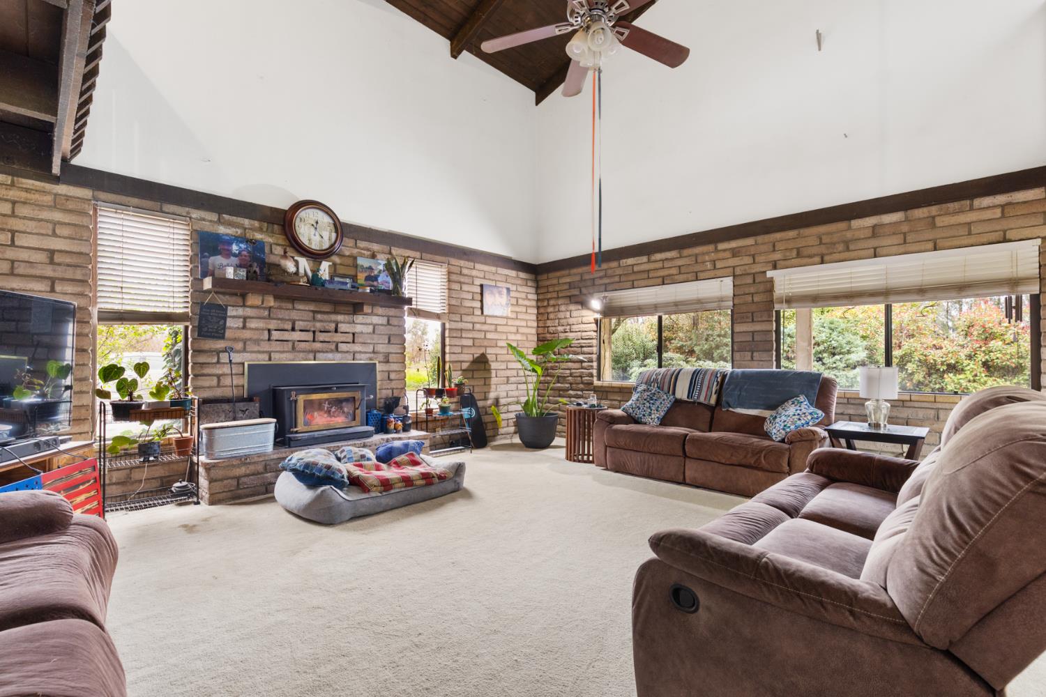 3781 Larkin Road Biggs, CA 95917 - Photo 3 of 34 a living room with furniture fireplace and a large window