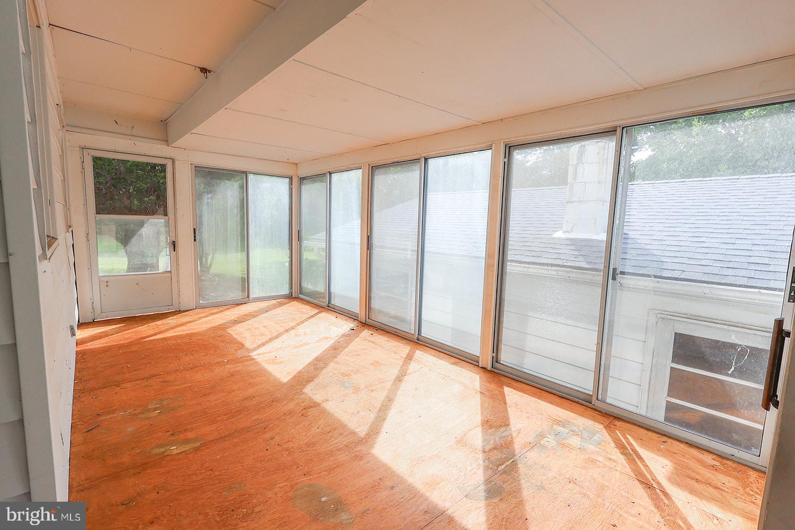 48146 Mallard View Lane St. Inigoes, MD 20684 - Photo 32 of 46 Bright and airy sunroom retreat.