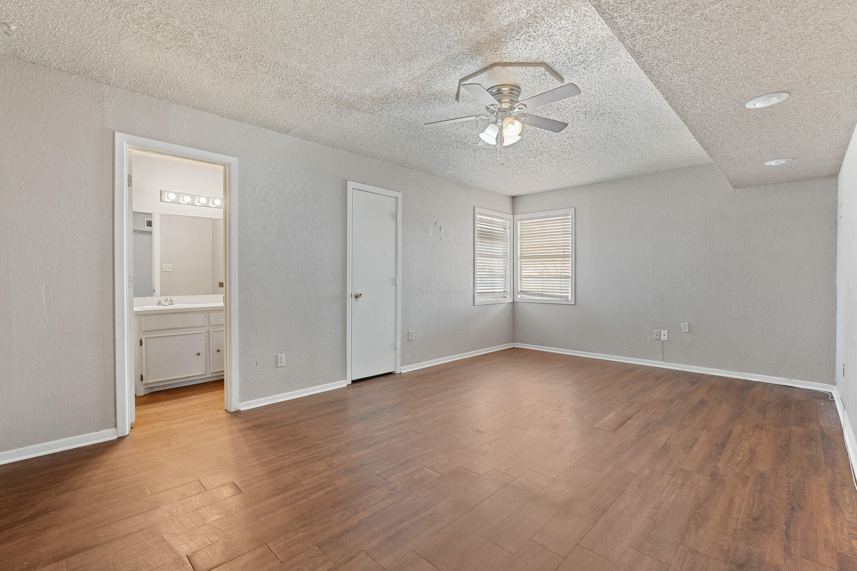 3602 31st Street Lubbock, TX 79410 - Photo 7 of 15 a view of an empty room with a window