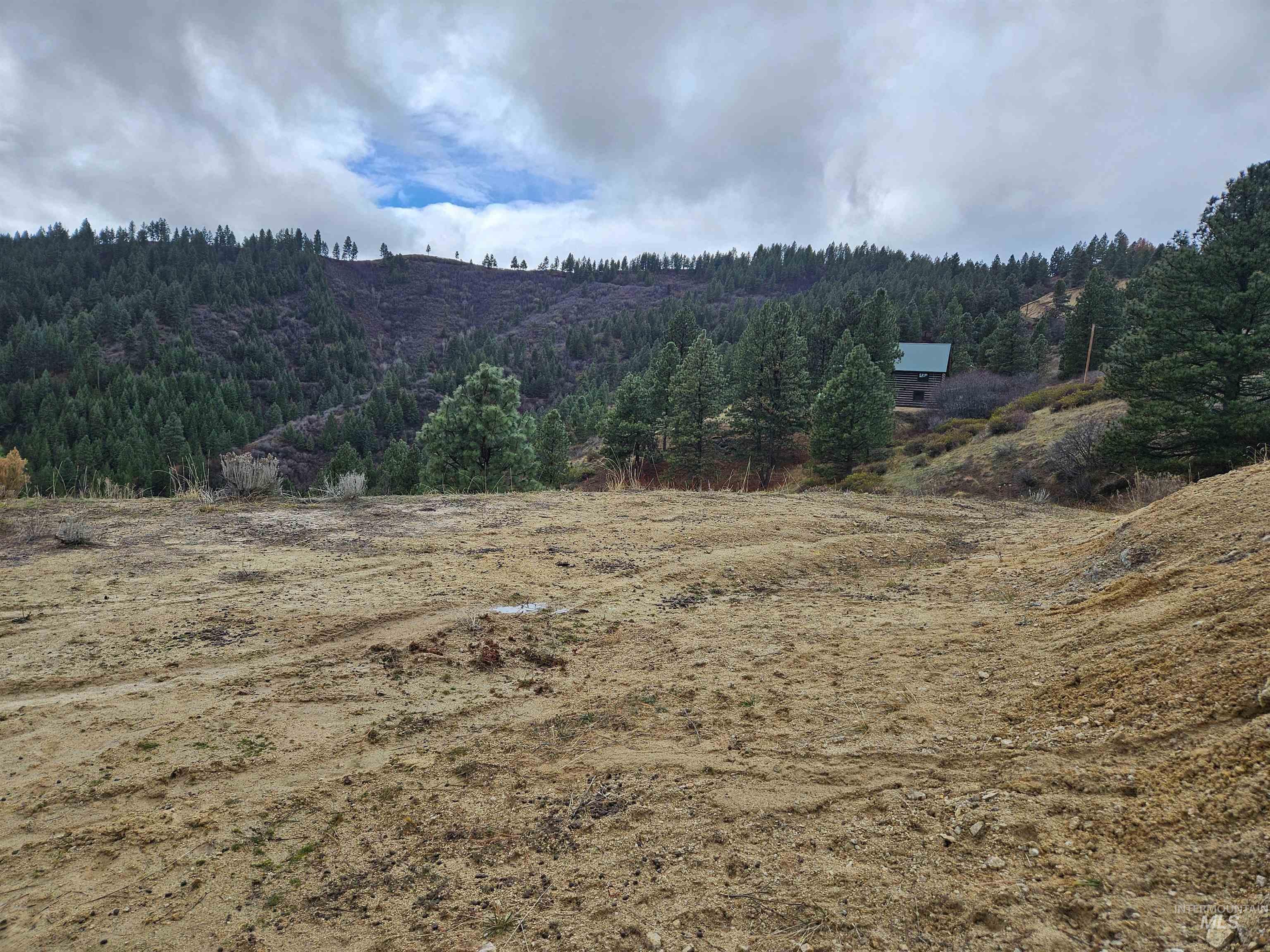 Lot 64 Wilderness Way Boise, ID 83716 - Photo 4 of 36 View of mountain background featuring a forest and rural landscape