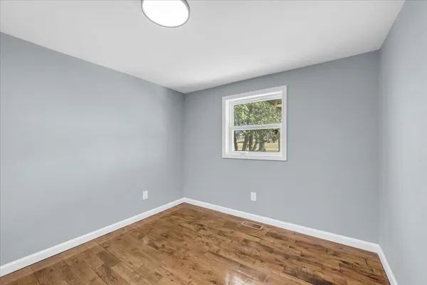 an empty room with a window