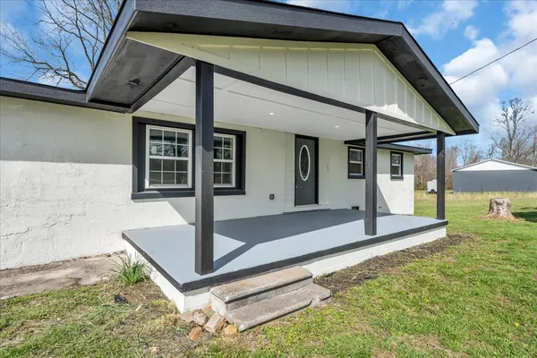 a front view of a house with porch