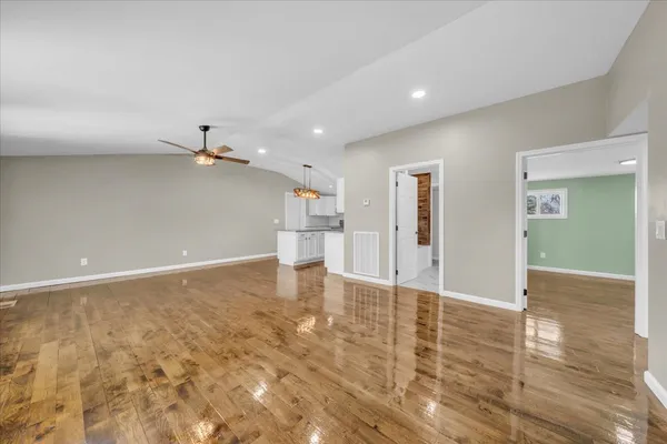 a view of a livingroom with wooden floor