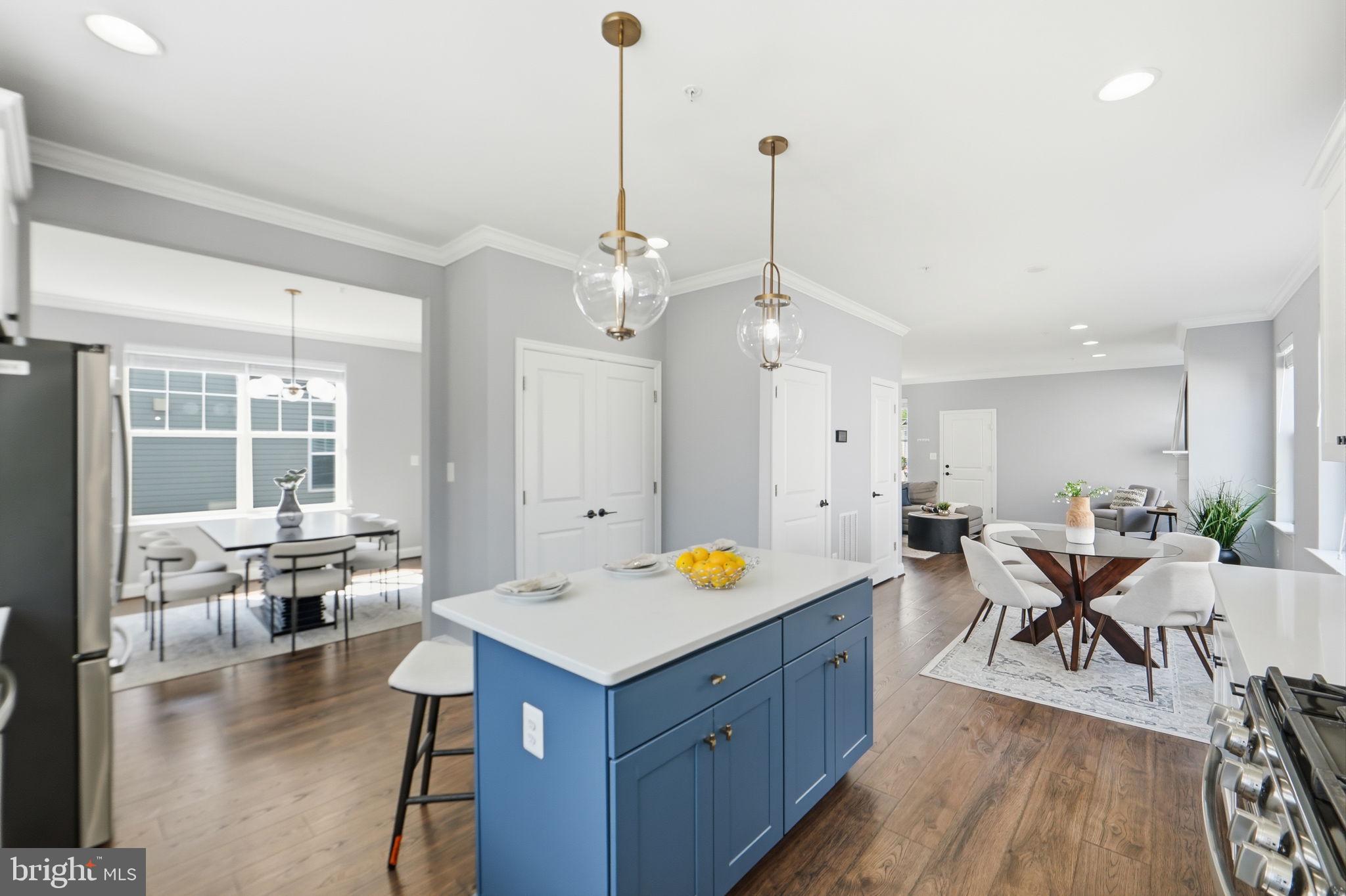14309 Drayton Avenue Silver Spring, MD 20904 - Photo 12 of 44 a view of a kitchen and dining table chairs