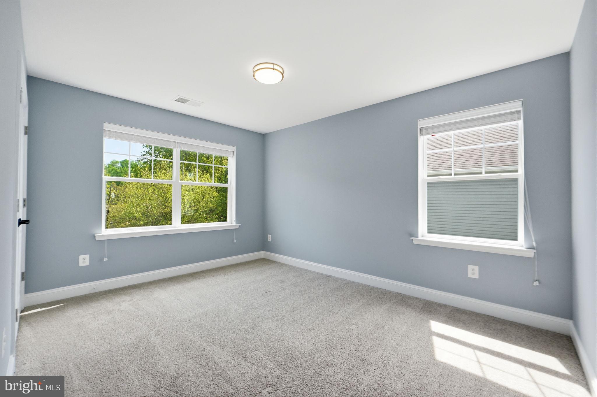 14309 Drayton Avenue Silver Spring, MD 20904 - Photo 24 of 44 an empty room with windows