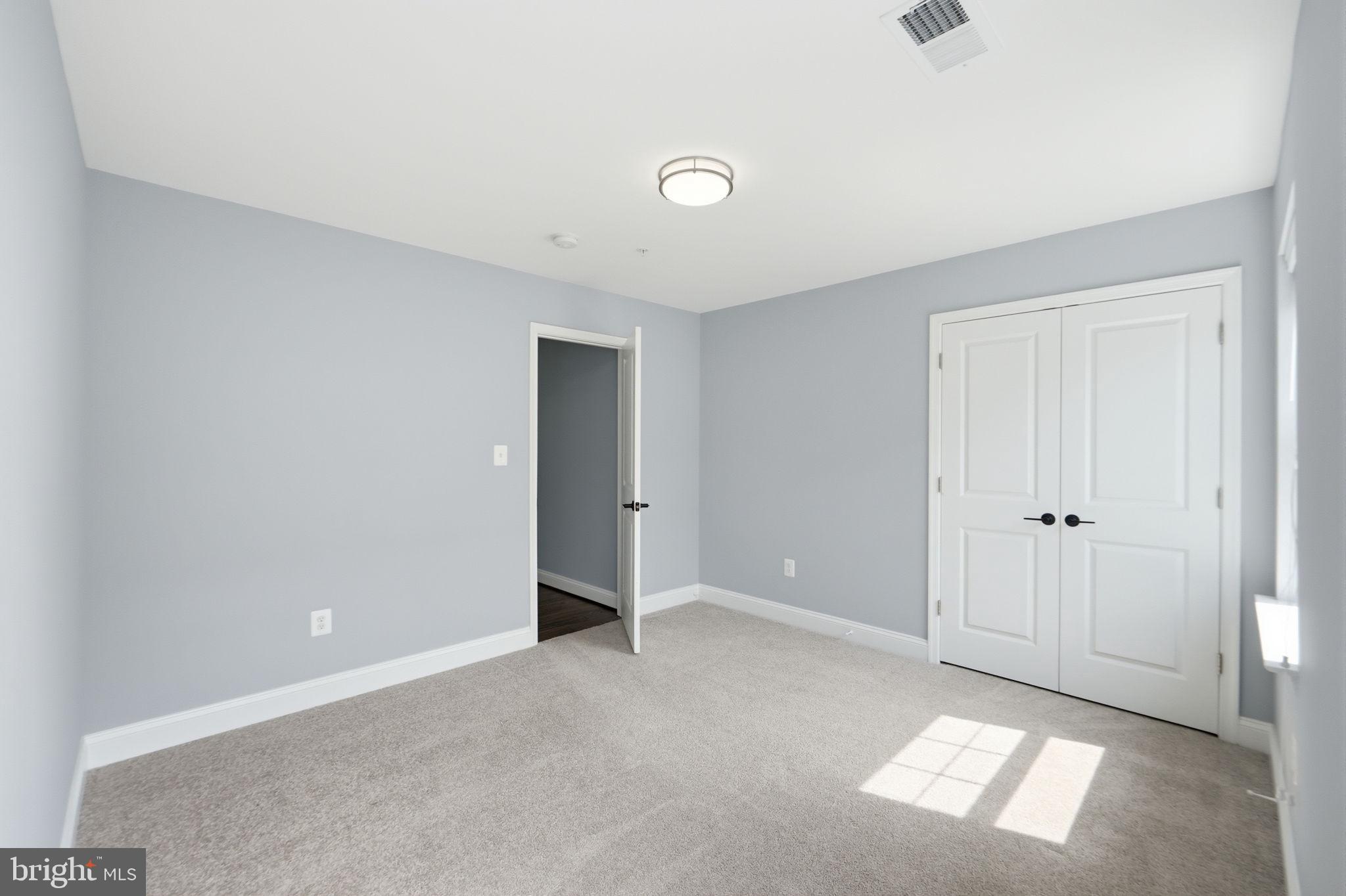 14309 Drayton Avenue Silver Spring, MD 20904 - Photo 26 of 44 a view of an empty room and window
