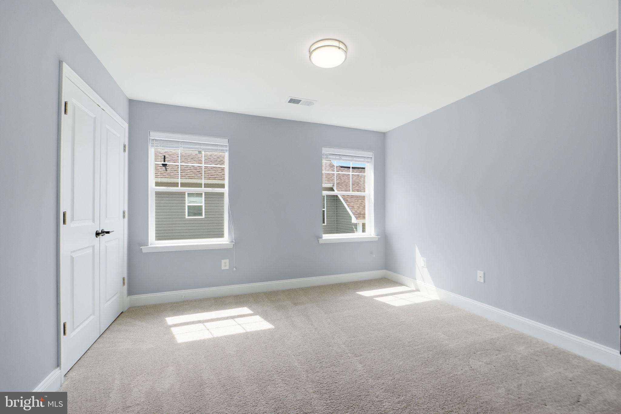 14309 Drayton Avenue Silver Spring, MD 20904 - Photo 29 of 44 an empty room with windows