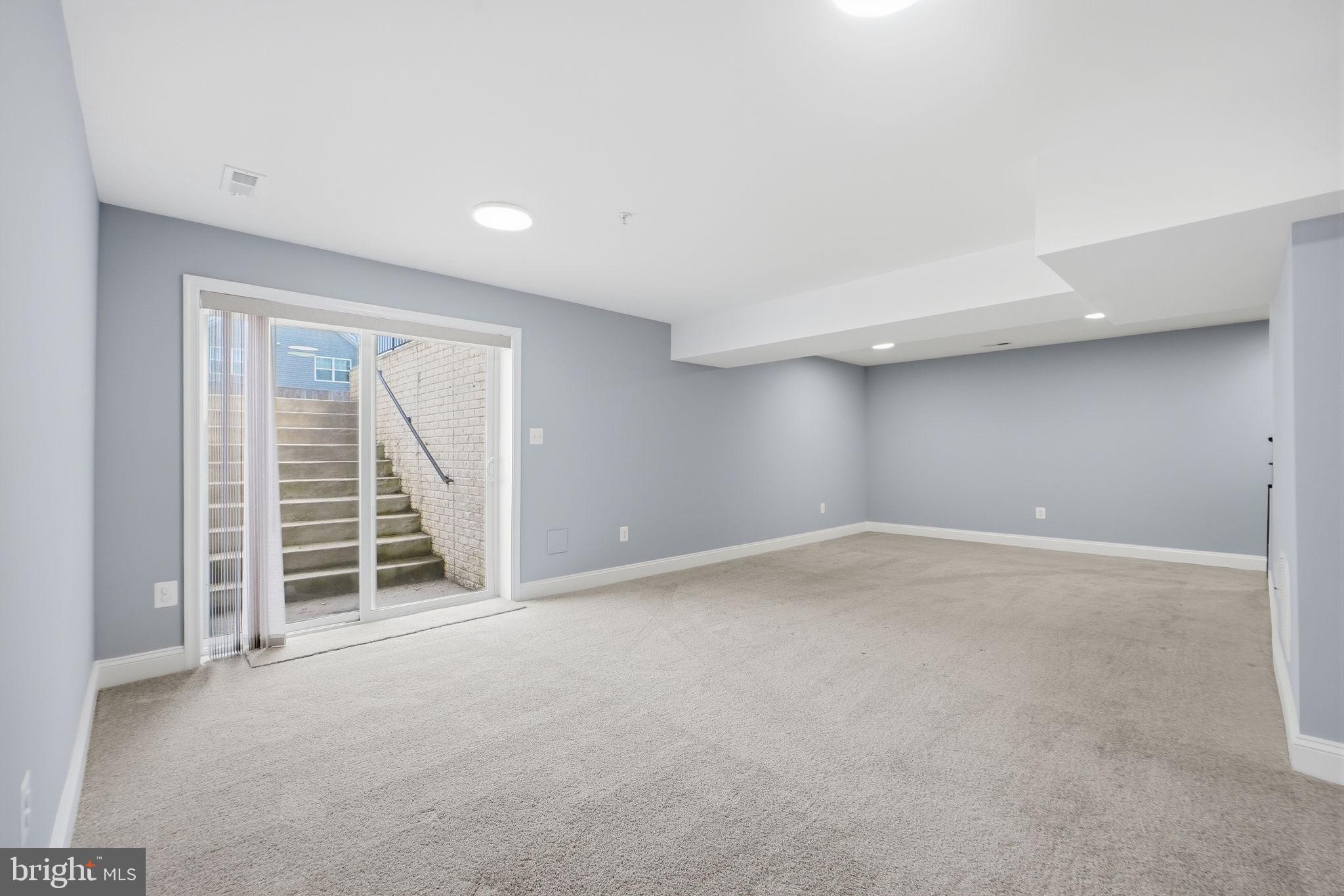 14309 Drayton Avenue Silver Spring, MD 20904 - Photo 33 of 44 a view of an empty room with a garage
