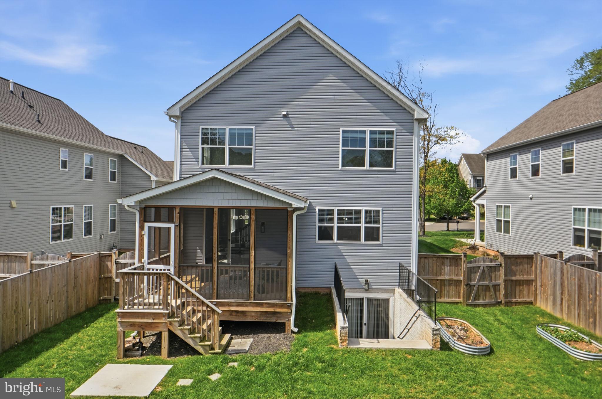 14309 Drayton Avenue Silver Spring, MD 20904 - Photo 6 of 44 a view of a house with a yard porch and sitting area