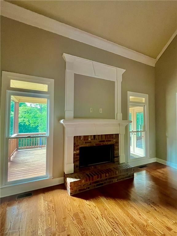 348 Hidden Trail Pendergrass, GA 30567 - Photo 23 of 40 a living room with furniture and a fireplace
