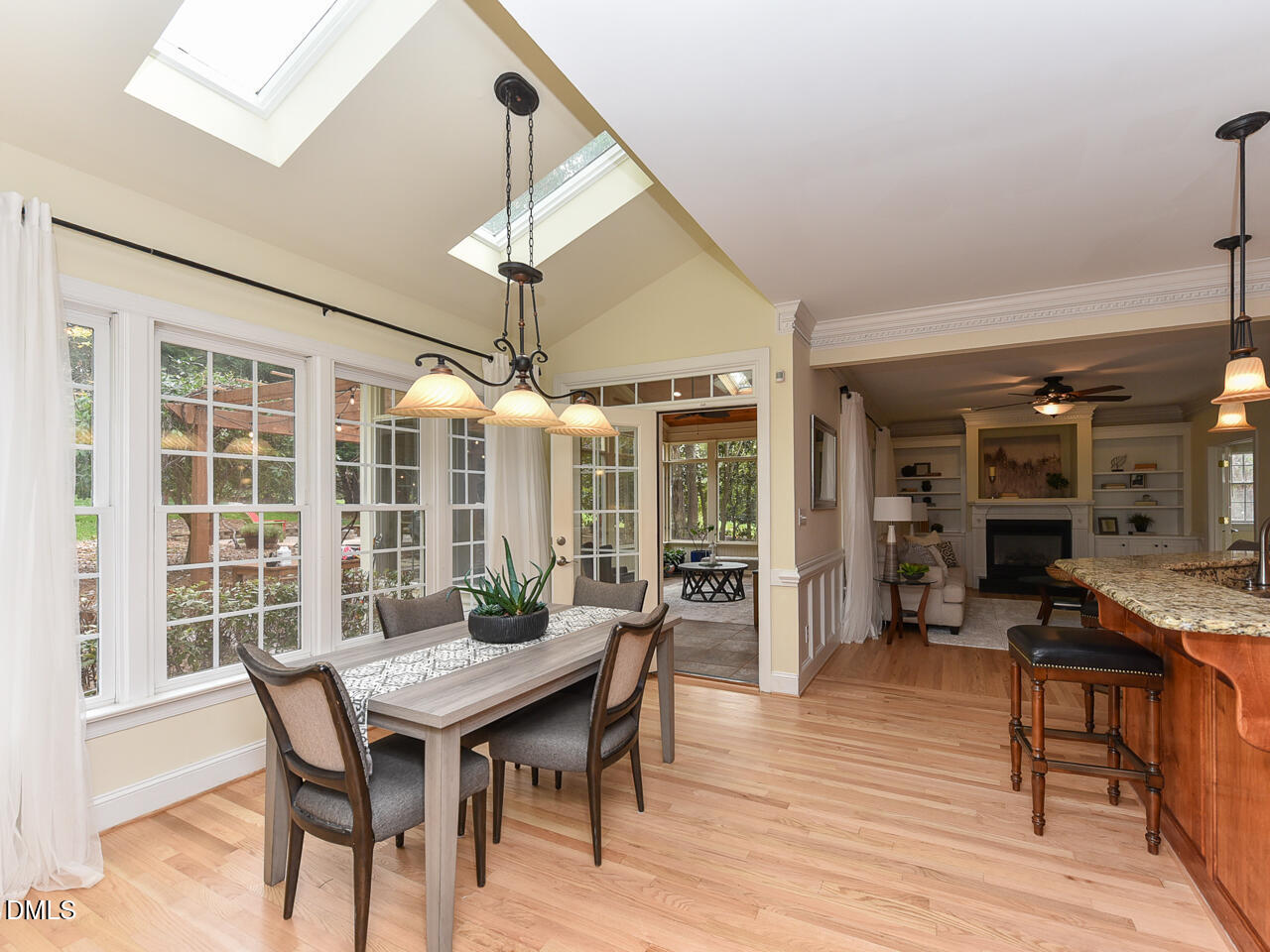 7108 Millstone Ridge Court Raleigh, NC 27614 - Photo 16 of 50 a view of a dining room with furniture window and outside view