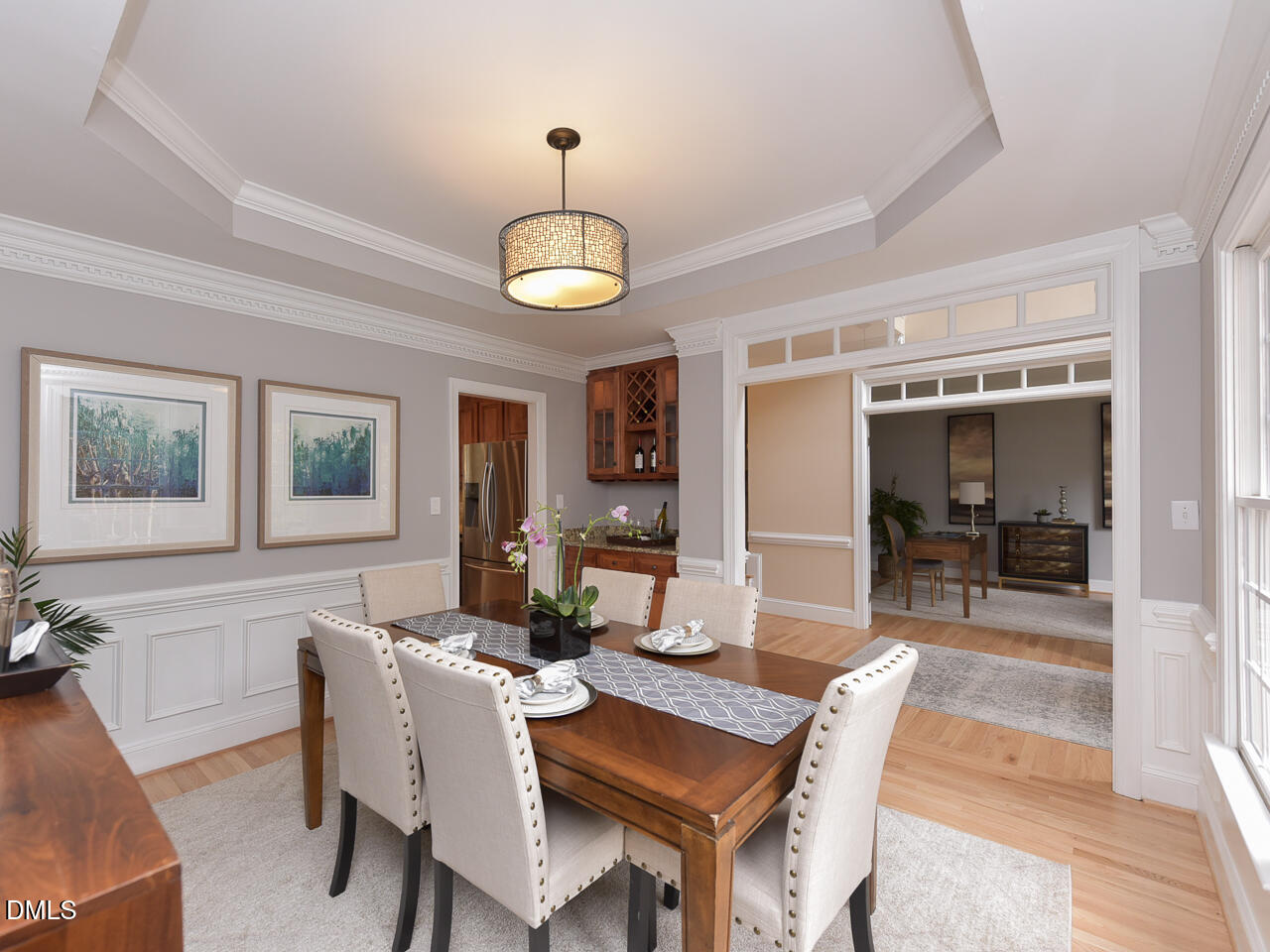 7108 Millstone Ridge Court Raleigh, NC 27614 - Photo 20 of 50 a view of a dining room with furniture wooden floor and chandelier