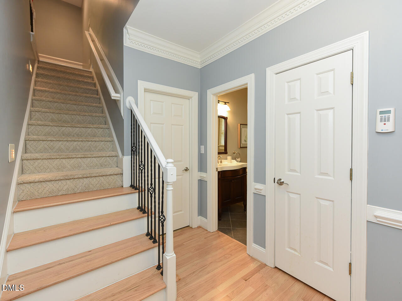 7108 Millstone Ridge Court Raleigh, NC 27614 - Photo 27 of 50 a view of entryway with wooden floor and stairs