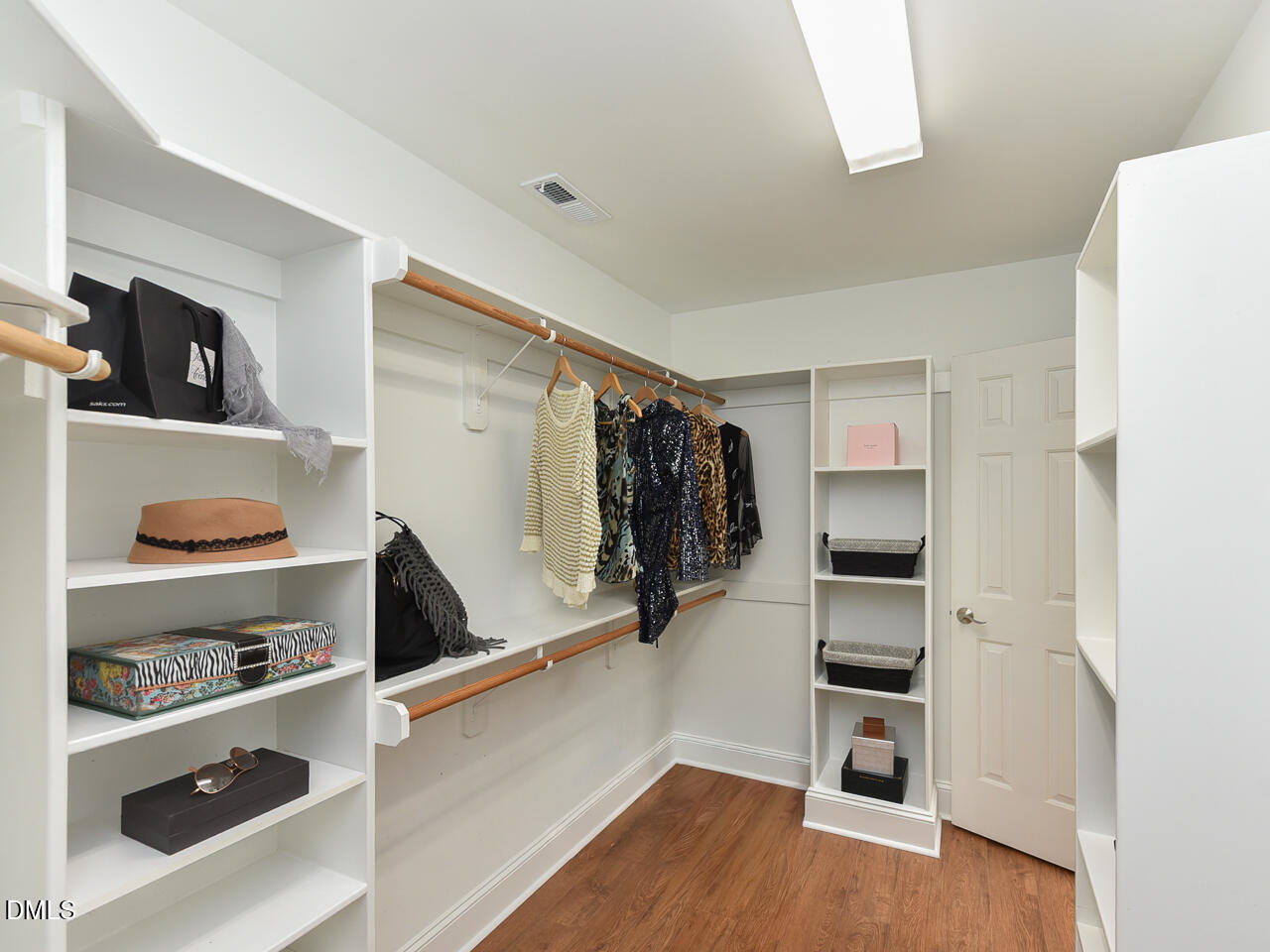 7108 Millstone Ridge Court Raleigh, NC 27614 - Photo 33 of 50 a view of walk in closet with clothes and shoes
