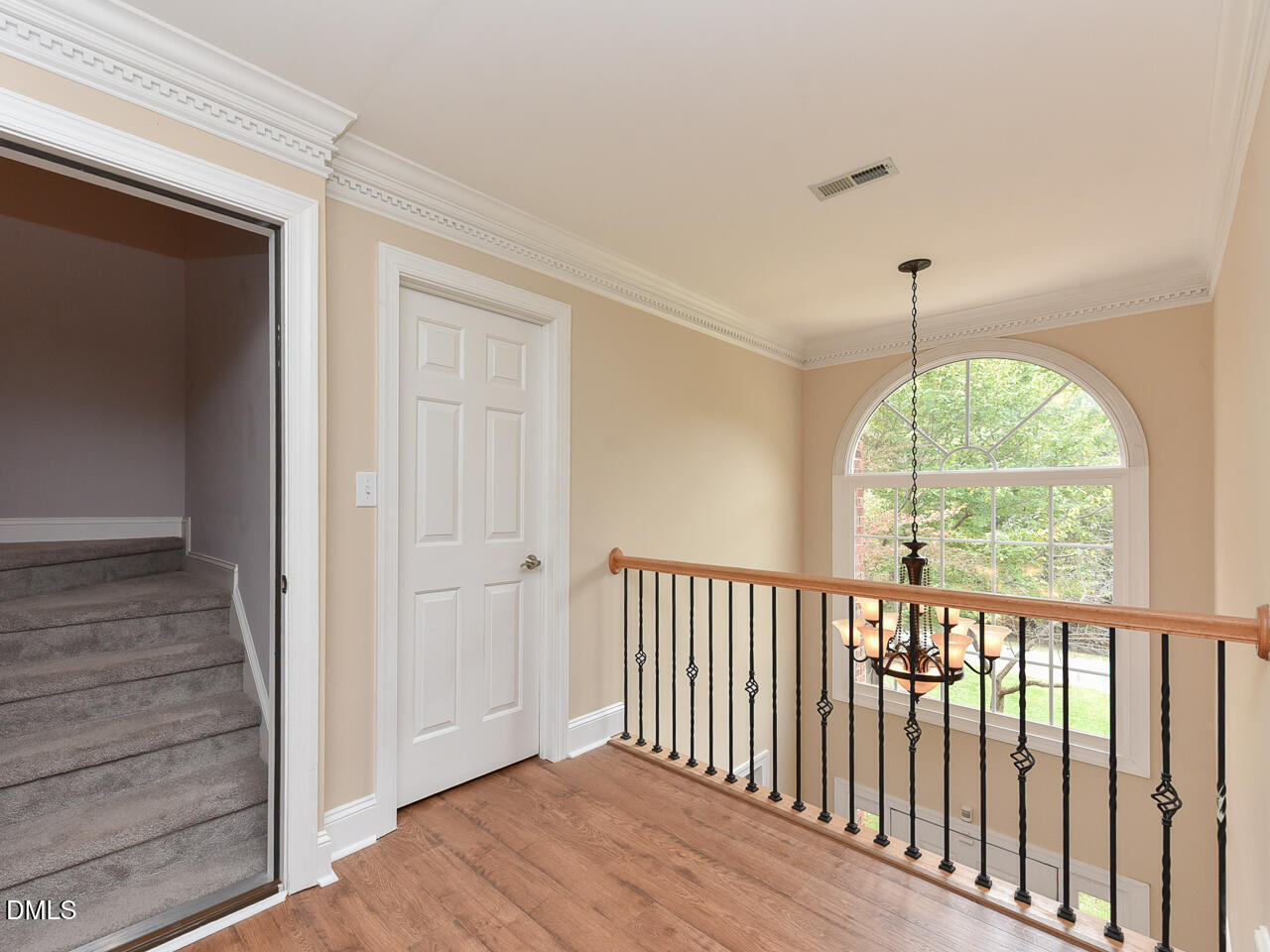 7108 Millstone Ridge Court Raleigh, NC 27614 - Photo 38 of 50 a view of hallway with wooden floor and a window