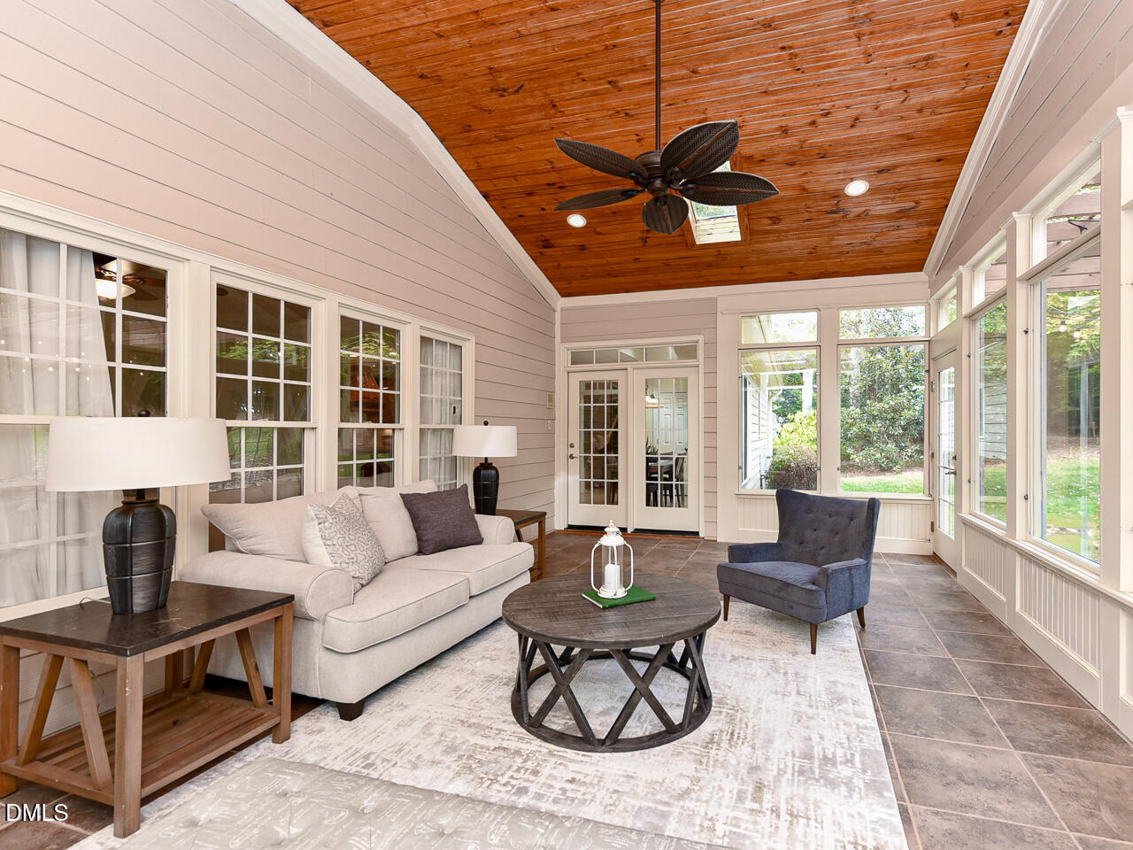 7108 Millstone Ridge Court Raleigh, NC 27614 - Photo 42 of 50 a living room with furniture and a large window