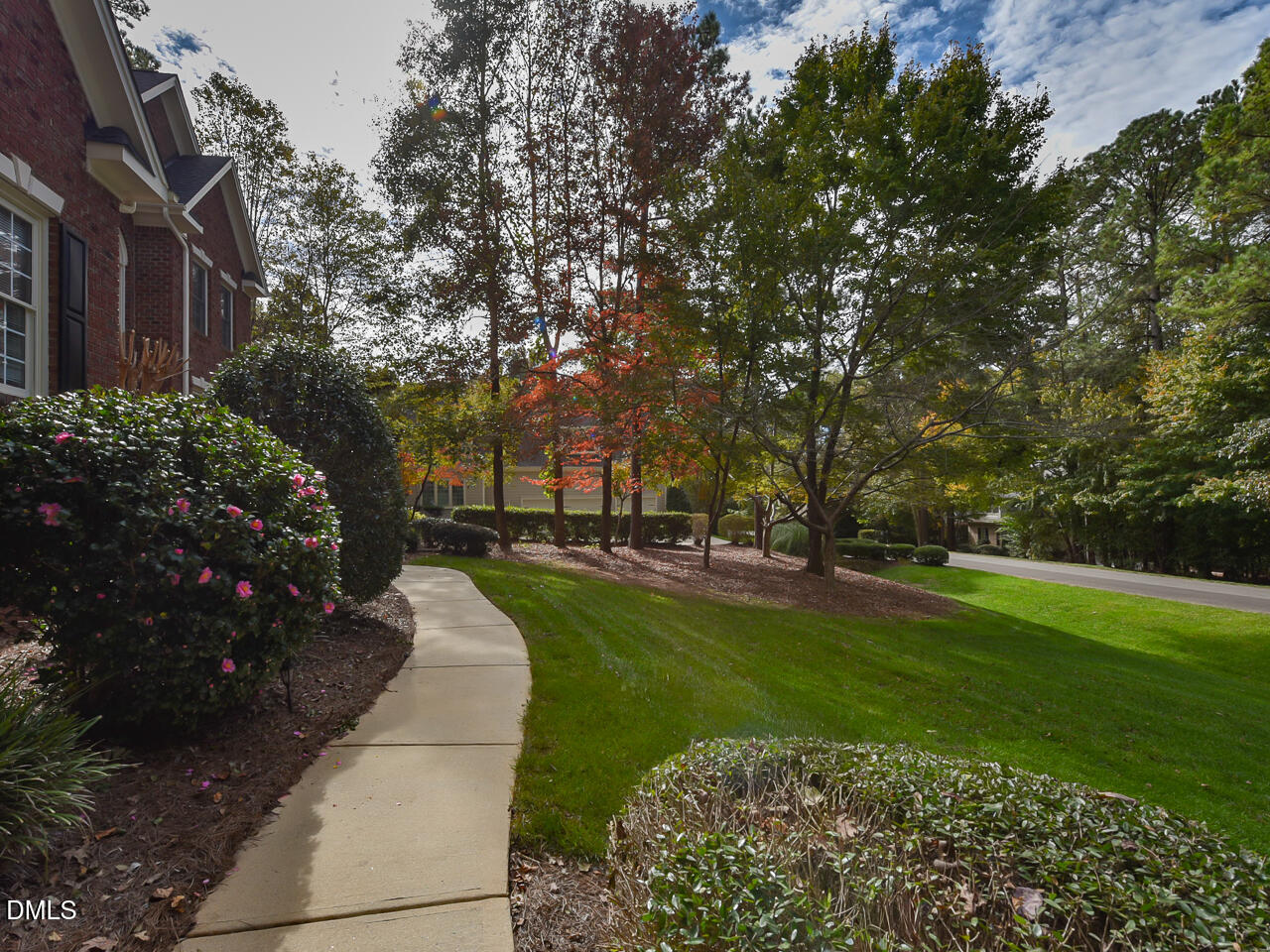 7108 Millstone Ridge Court Raleigh, NC 27614 - Photo 5 of 50 a view of a garden with a bench