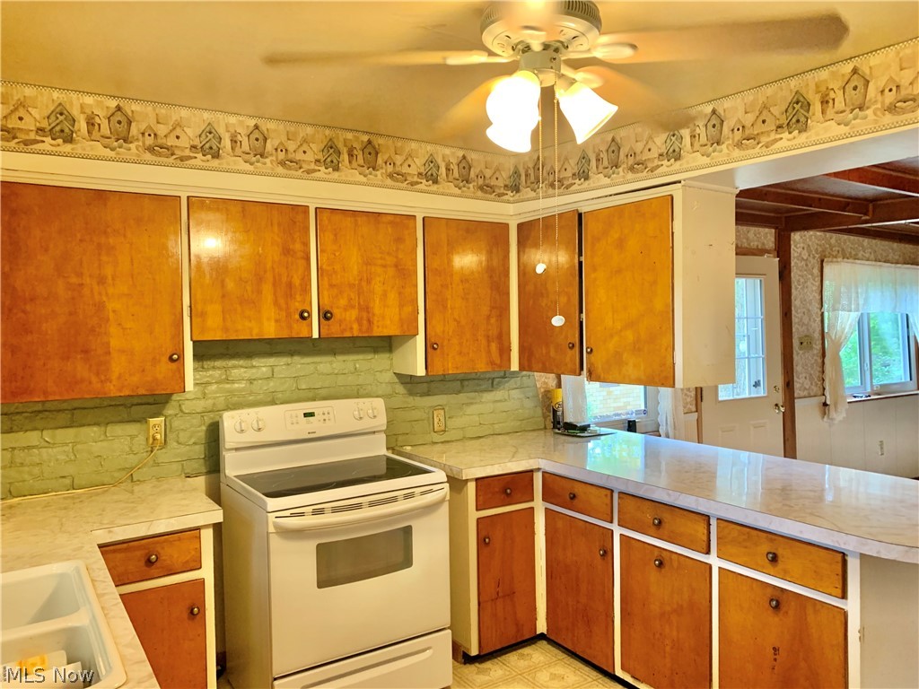9198 Tallmadge Road Diamond, OH 44412 - Photo 12 of 35 Kitchen with electric stove