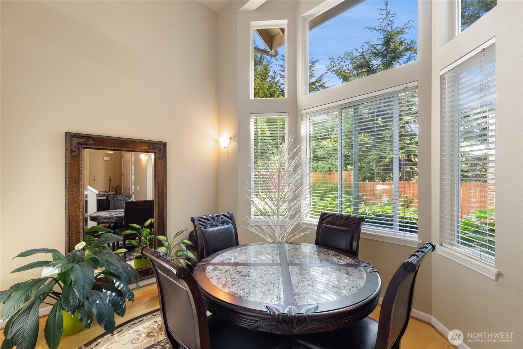 442 Tacoma Place Northeast Renton, WA 98056 - Photo 3 of 17 a view of a dining room with furniture window and outside view