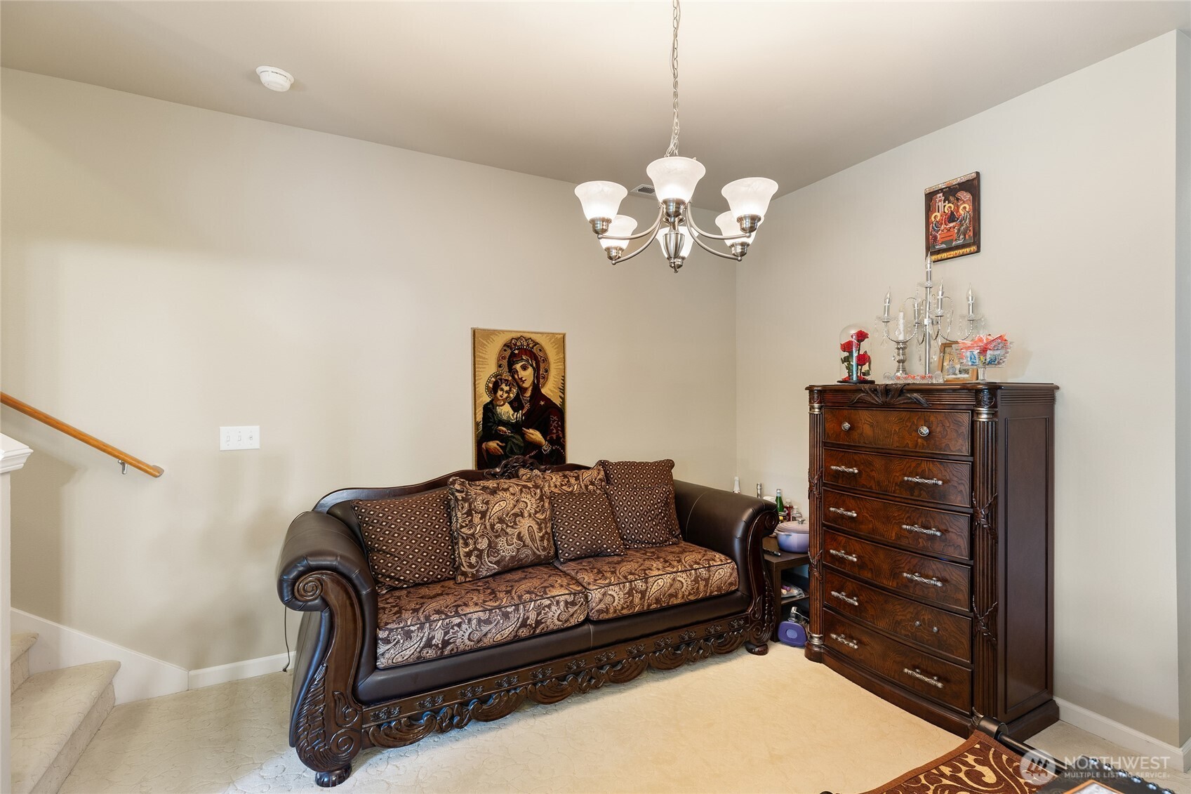 442 Tacoma Place Northeast Renton, WA 98056 - Photo 4 of 17 a living room with furniture a chandelier and a window