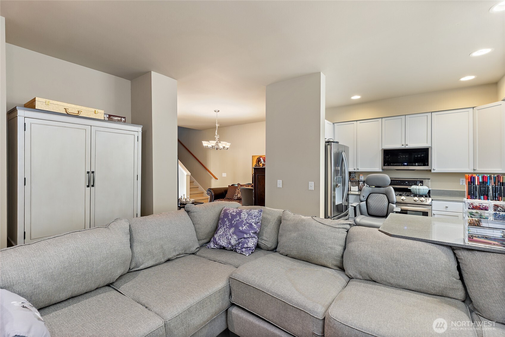 442 Tacoma Place Northeast Renton, WA 98056 - Photo 7 of 17 a living room with furniture and a flat screen tv