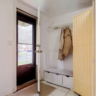 a bathroom with a shower and a sink